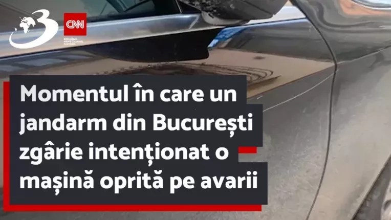 Momentul in care un jandarm din Bucuresti zgarie intentionat o masina oprita pe avarii
